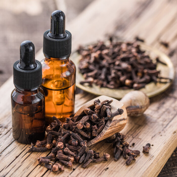 Essential oil of clove background spice concept